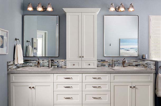 White bathroom cabinets, two mirrors and two sinks - large image