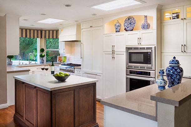 Kitchen island, countertops and white cabinets - large image