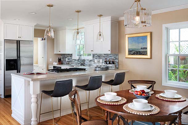 Kitchen showing barstools, dining table. - large image