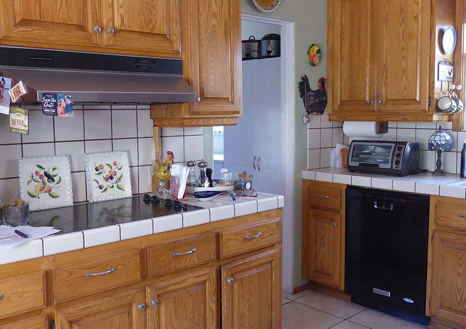 BEFORE: Dark cabinets, out-dated counter tile - x-large photo